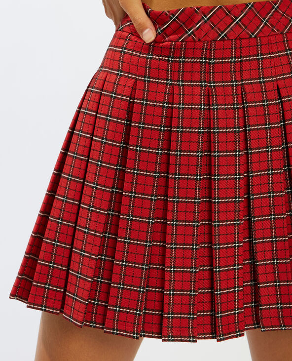 Jupe plissée sale rouge courte
