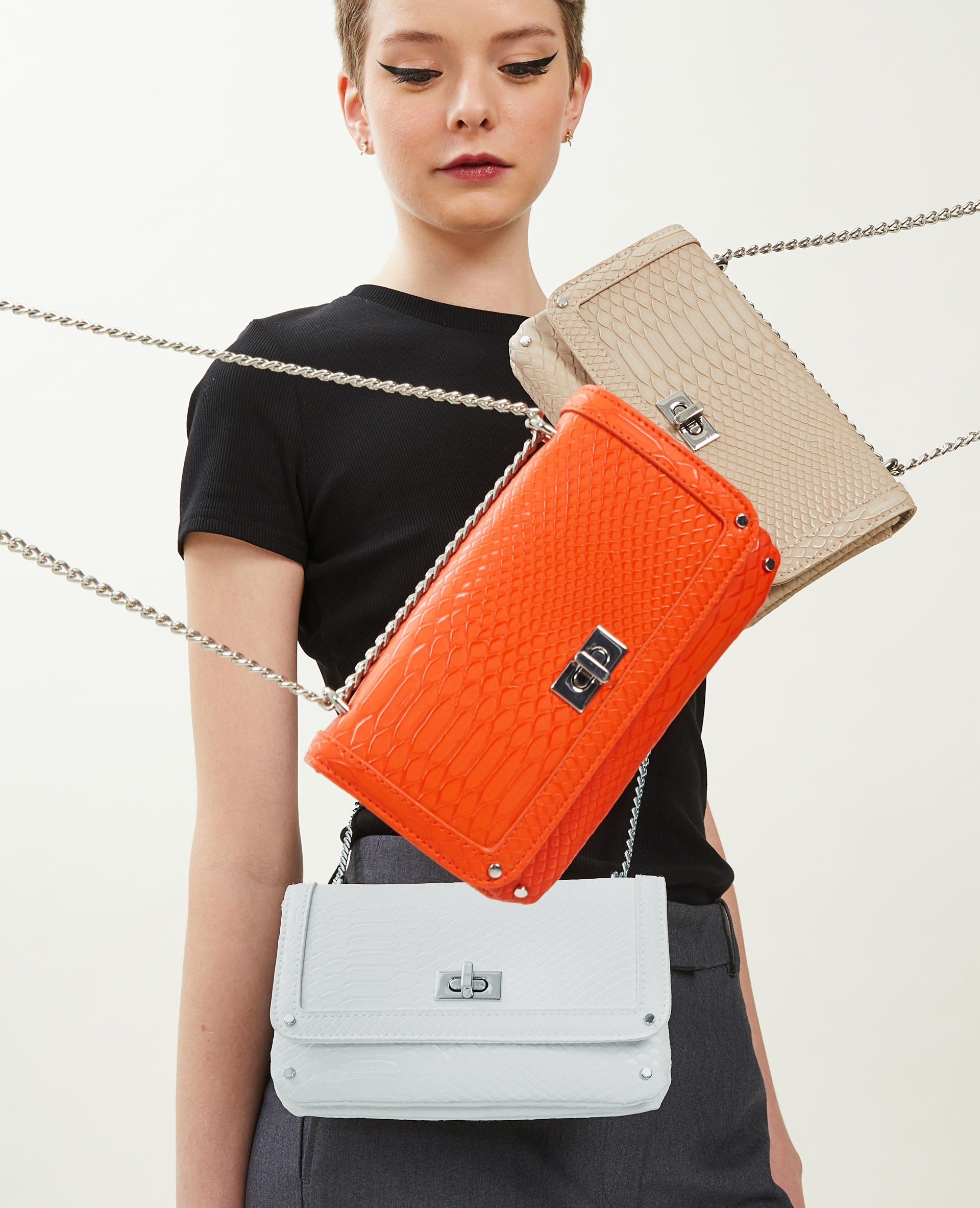 Sac pochette avec chaines orange - Pimkie